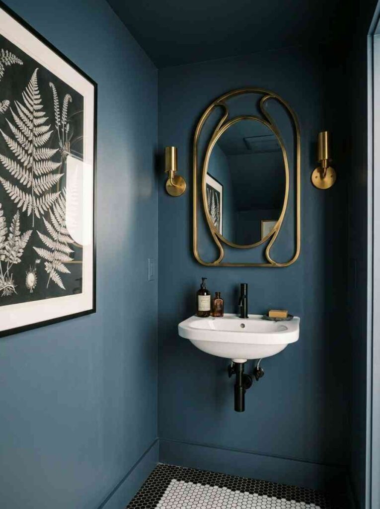 20 Bathroom Ideas 2026 A dramatic half bathroom with deep slate blue walls on all four sides creating a bold color-drench effect.