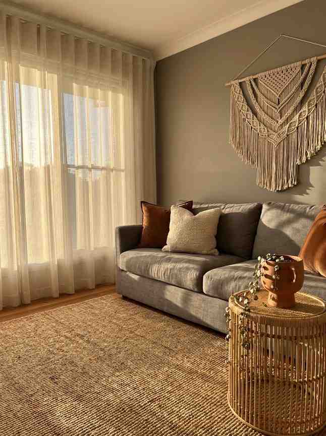 Living room with gray sofa 202606242321