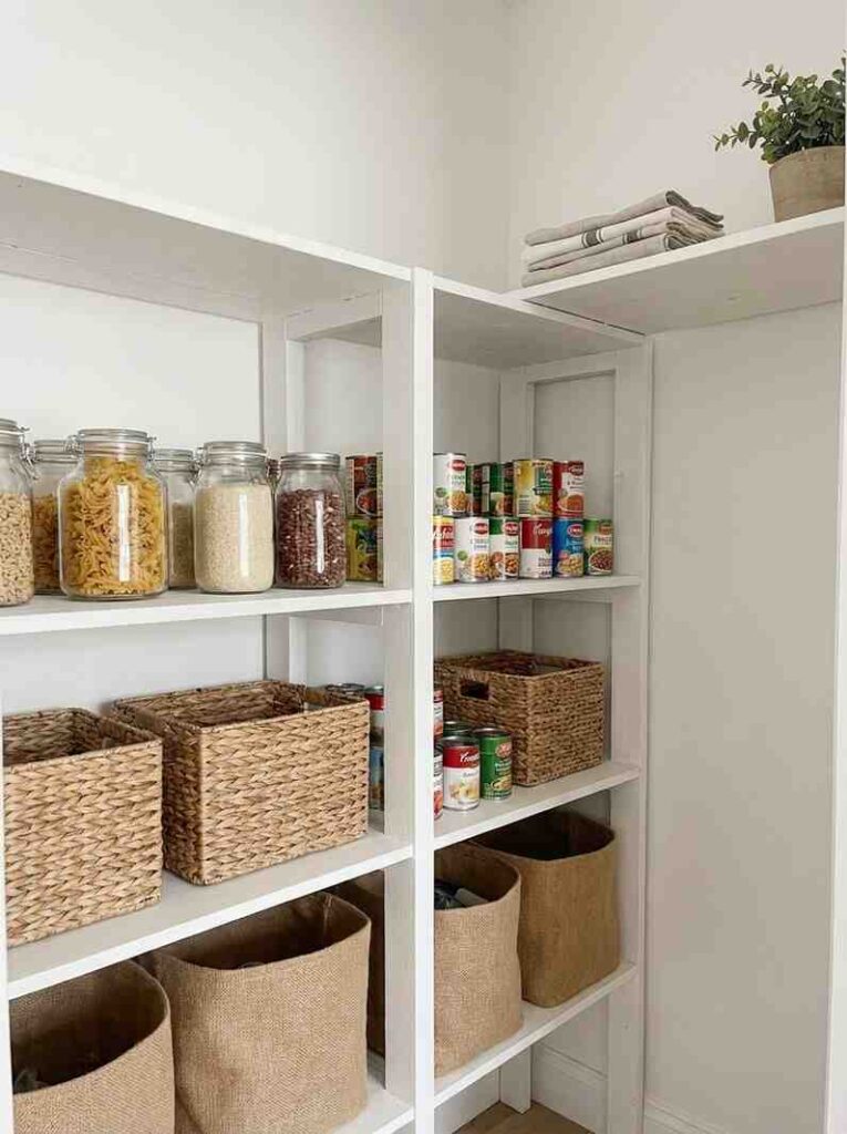 White pantry shelving unit styled 202607091957